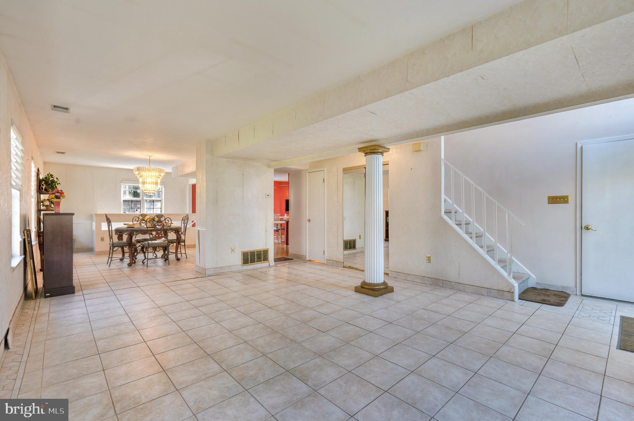 13360 Susan Terrace Philadelphia, PA 19116 - Photo 4 of 29 a view of a livingroom with table & chairs staircase