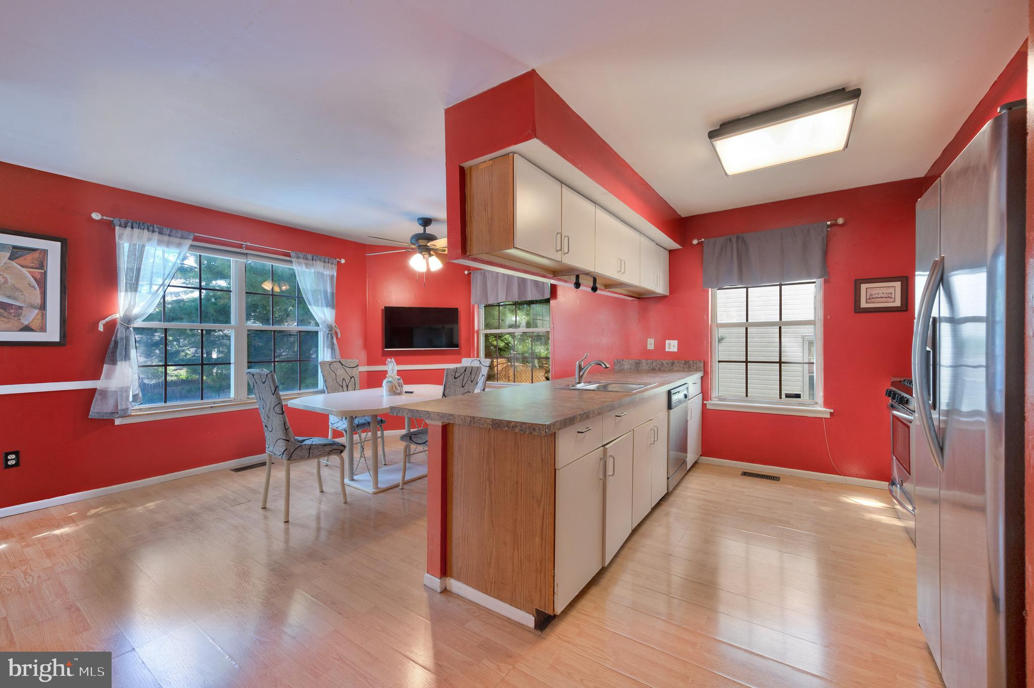 13360 Susan Terrace Philadelphia, PA 19116 - Photo 8 of 29 a kitchen with stainless steel appliances granite countertop a stove and a refrigerator