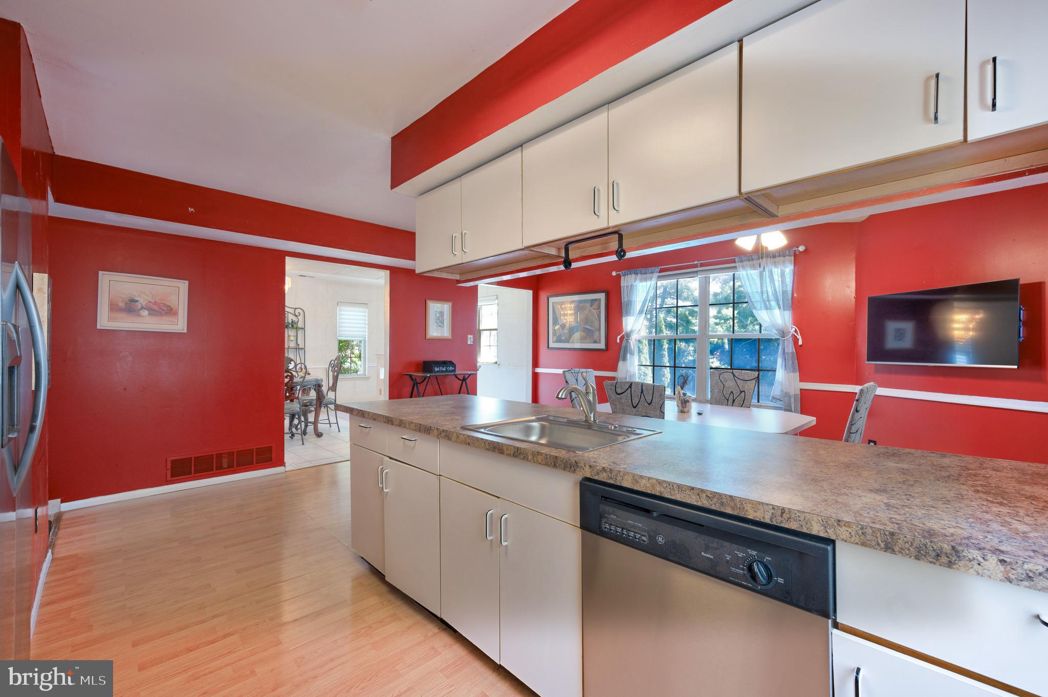 13360 Susan Terrace Philadelphia, PA 19116 - Photo 9 of 29 a kitchen with stainless steel appliances granite countertop a stove a sink and a microwave