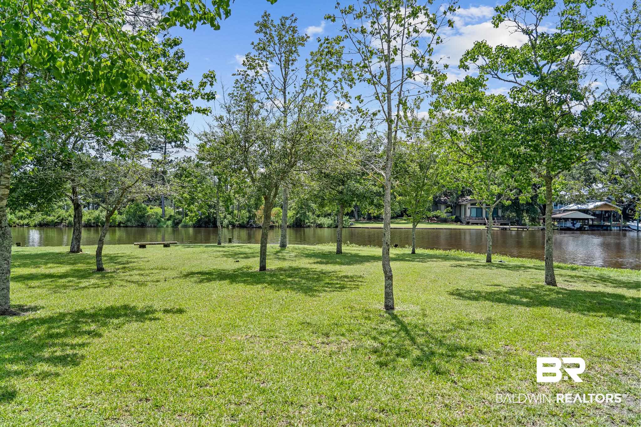 18513 Yacht Club Road Foley, AL 36535 - Photo 32 of 53 View of yard with a water view
