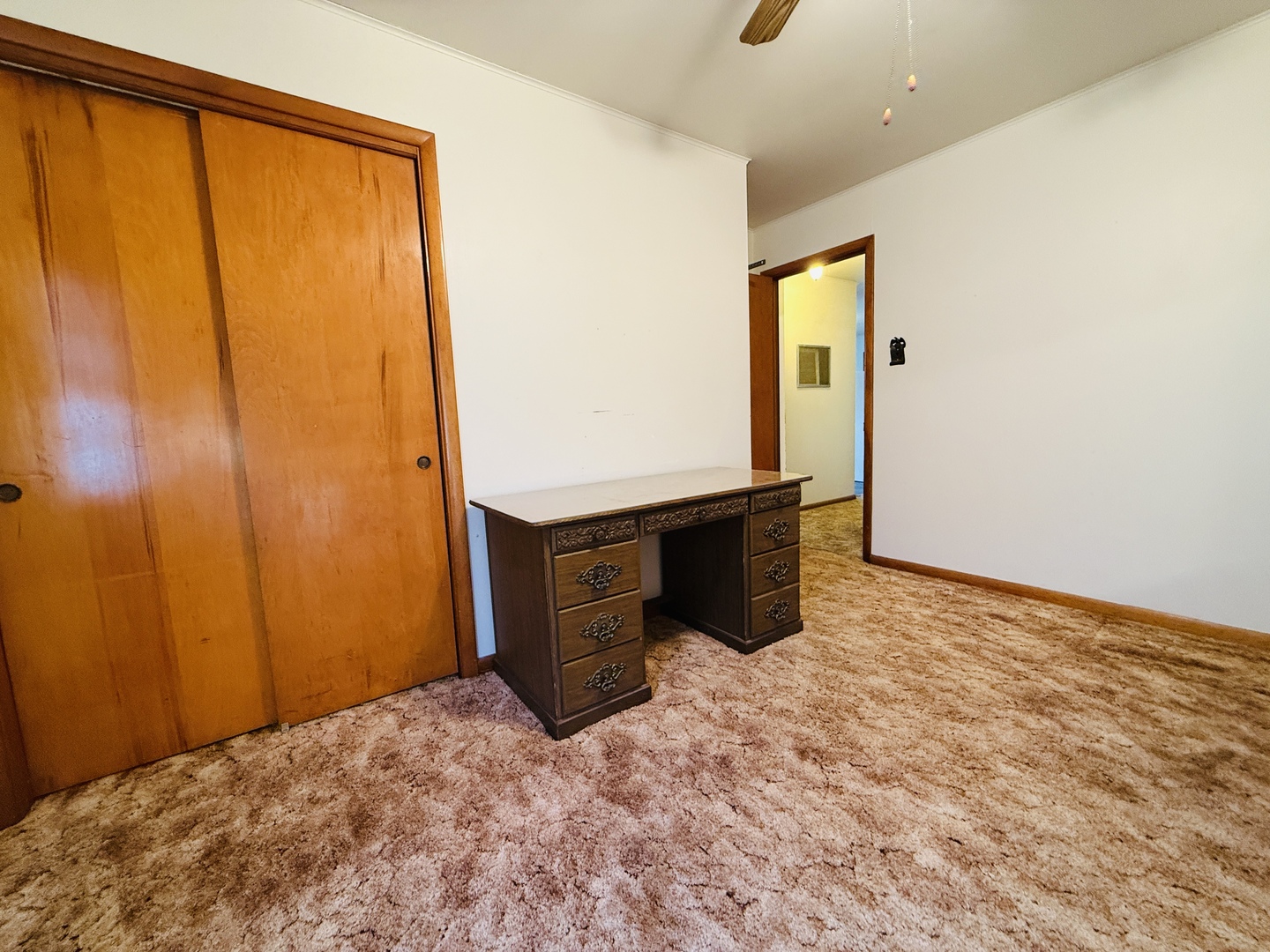 306 7th Street Cornell, IL 61319 - Photo 13 of 17 a view of an empty room with window and wooden floor