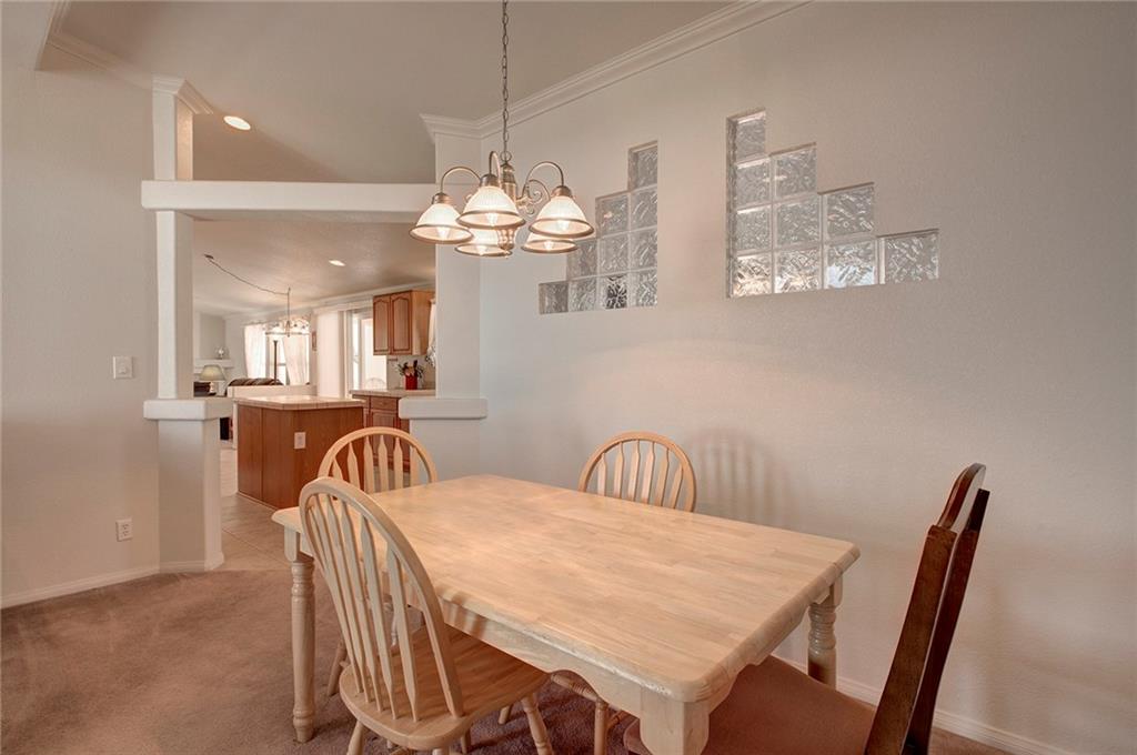 6186 Ranch Road Hartsel, CO 80449 - Photo 16 of 30 a view of a dining room with furniture