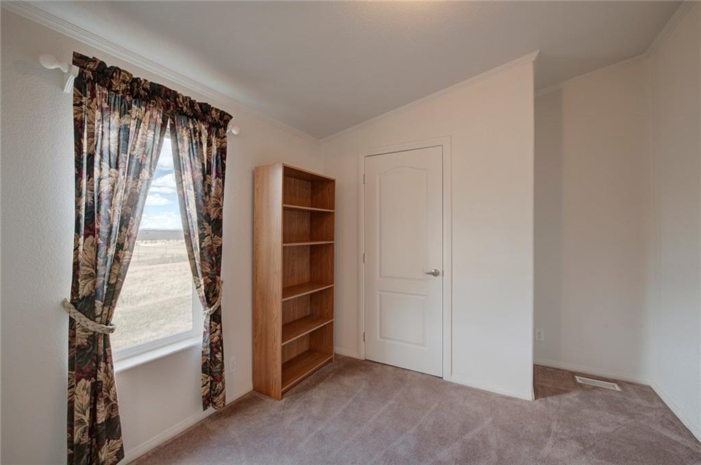 6186 Ranch Road Hartsel, CO 80449 - Photo 21 of 30 an empty room with windows