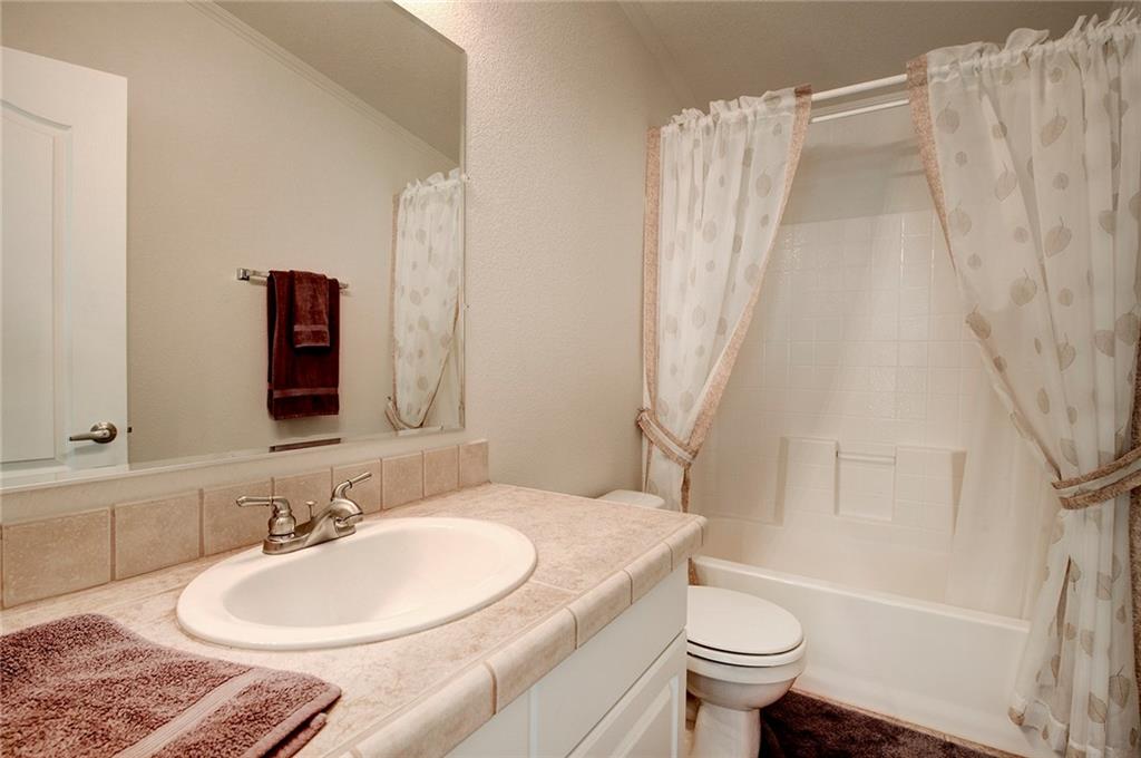 6186 Ranch Road Hartsel, CO 80449 - Photo 26 of 30 a bathroom with a sink toilet and shower