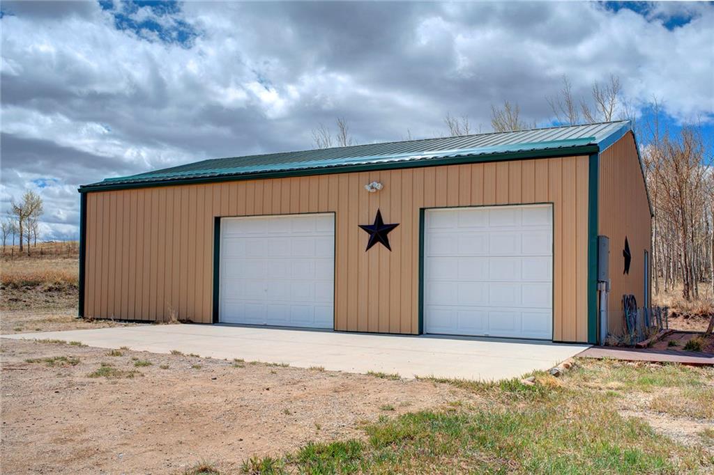 6186 Ranch Road Hartsel, CO 80449 - Photo 28 of 30 a view of a backyard with wooden fence
