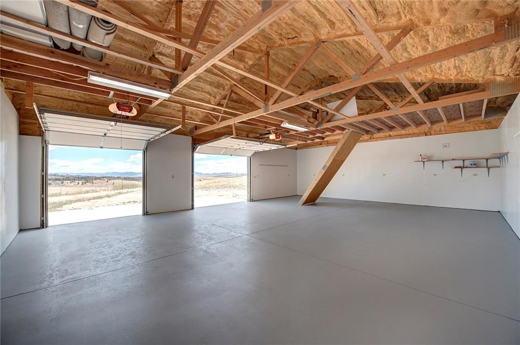 6186 Ranch Road Hartsel, CO 80449 - Photo 30 of 30 a view of a room with wooden walls and a window