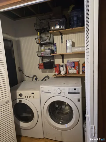 a utility room with dryer and washer