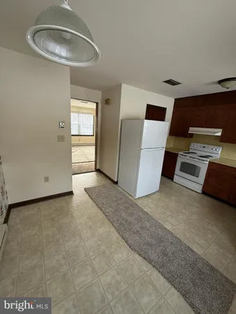a view of a livingroom with furniture and window