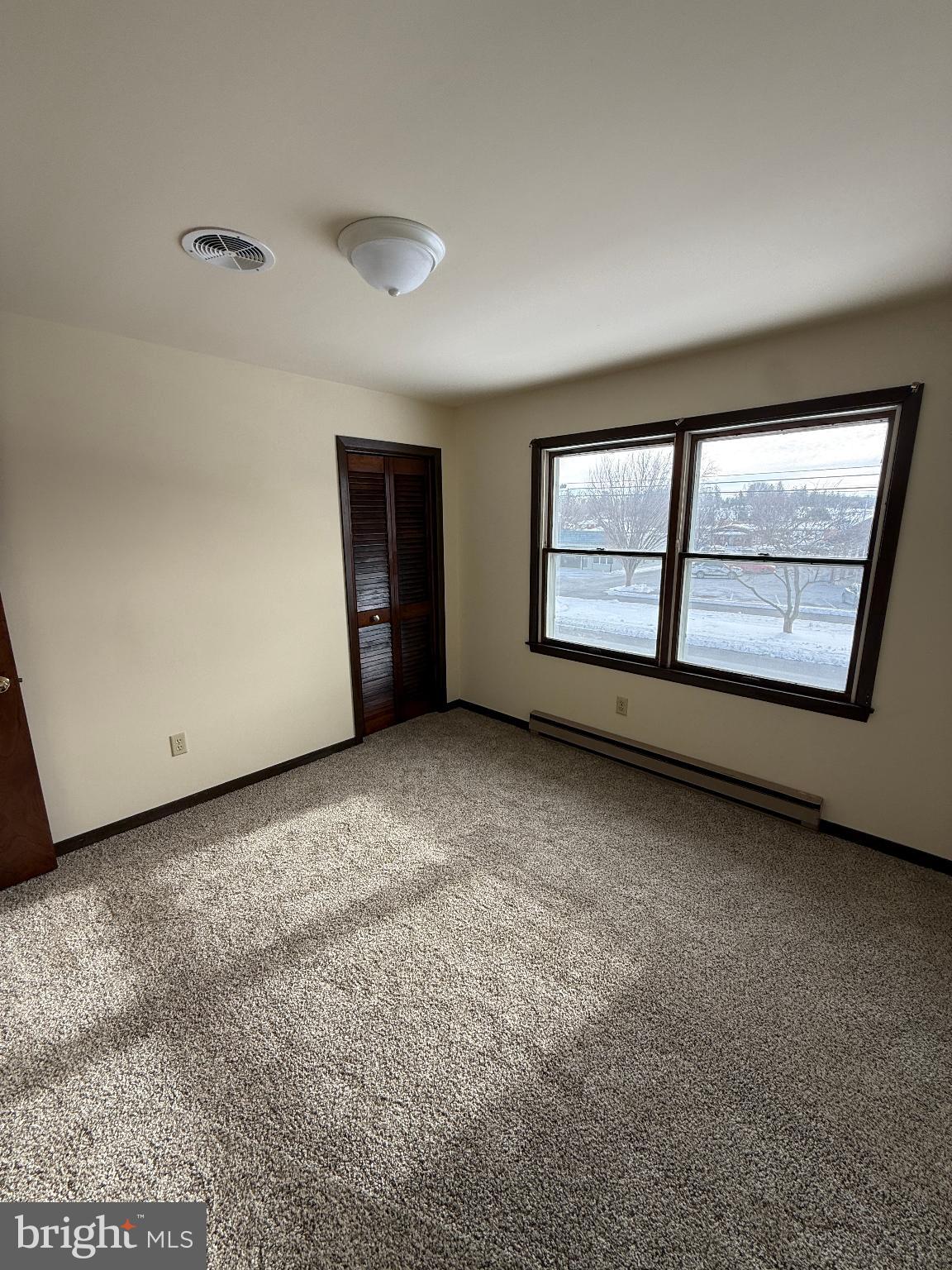 228 West 8th Street Waynesboro, PA 17268 - Photo 9 of 15 an empty room with windows