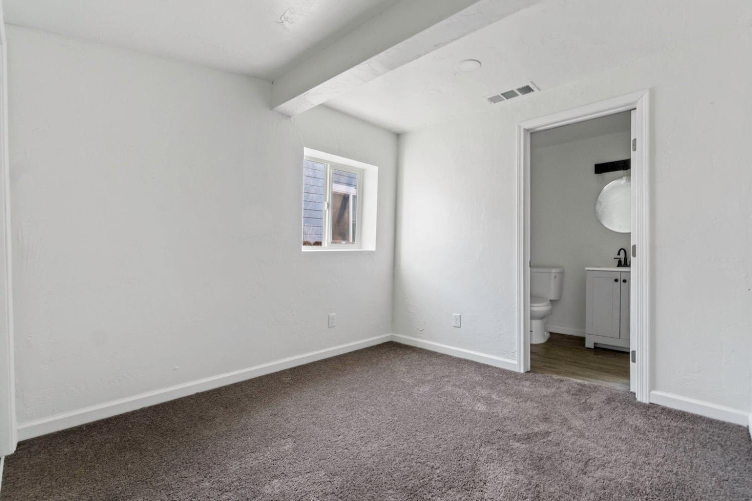 124 East 4th Street Hanford, CA 93230 - Photo 17 of 23 a view of an empty room