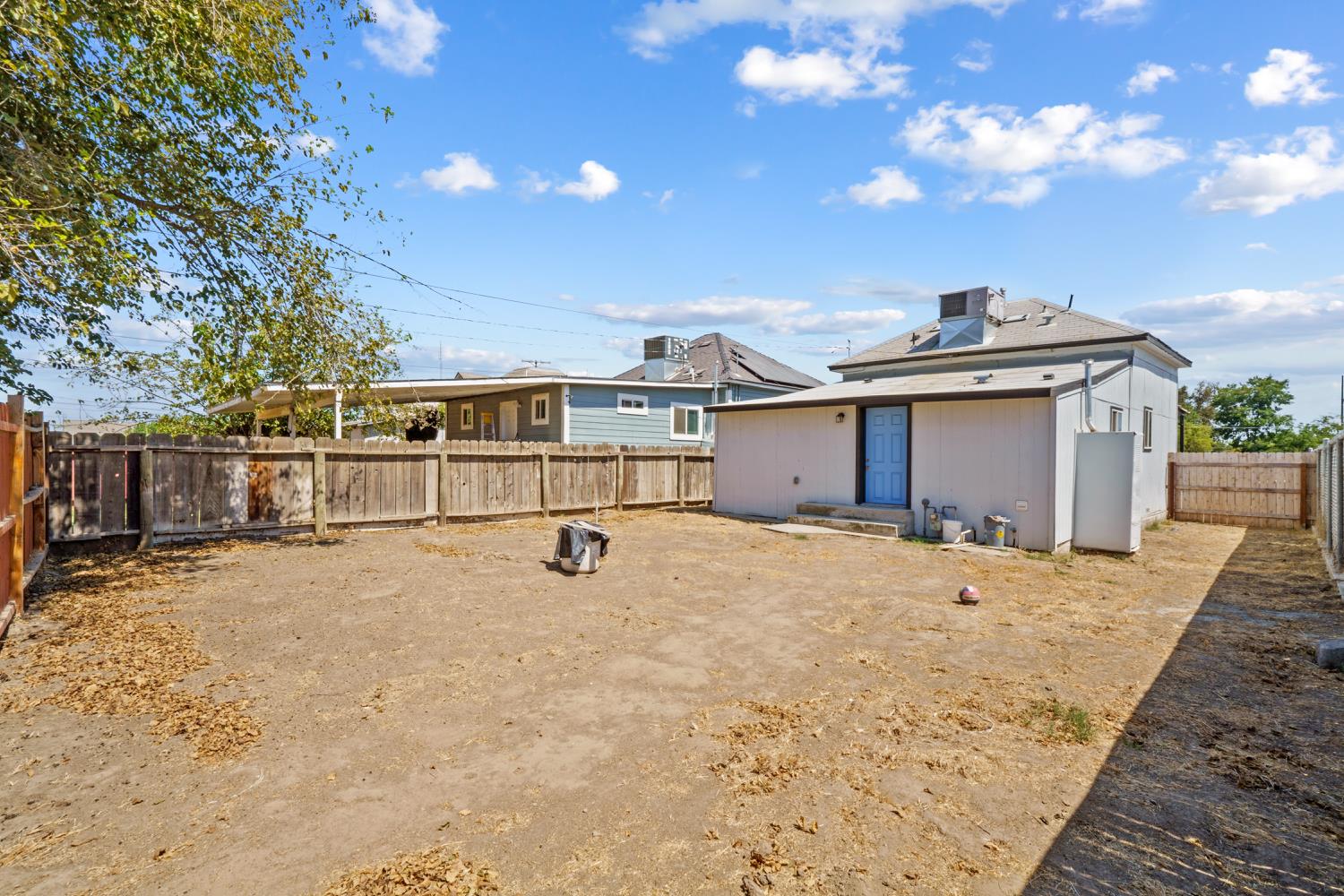 124 East 4th Street Hanford, CA 93230 - Photo 21 of 23 a view of a backyard
