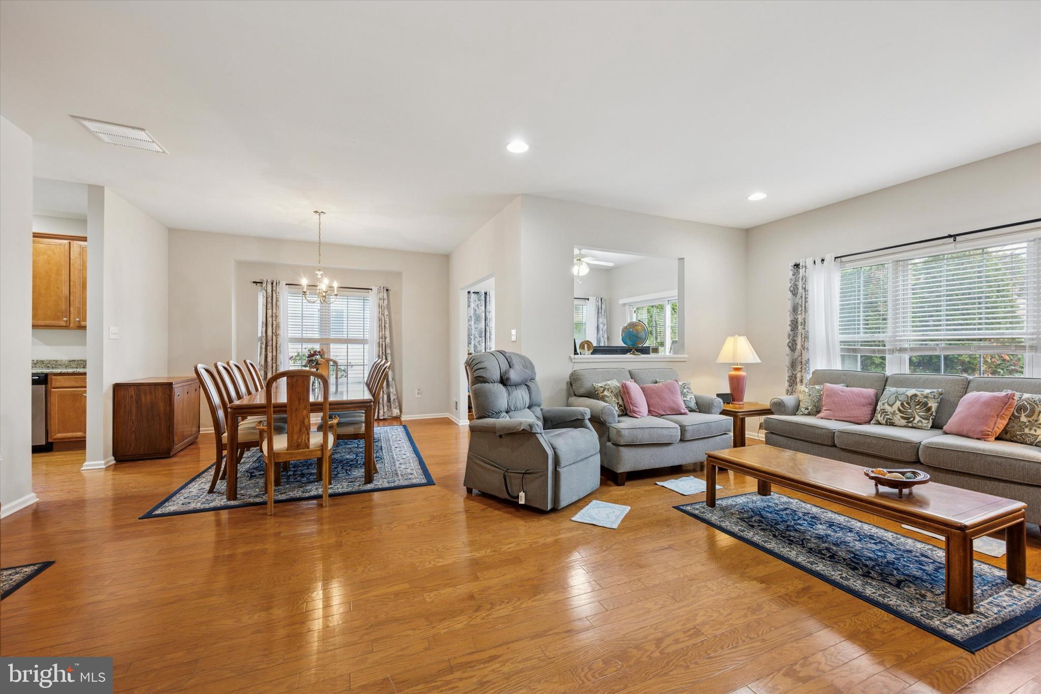 113 Summit Street Glassboro, NJ 08028 - Photo 12 of 25 a living room with furniture wooden floor and a large window