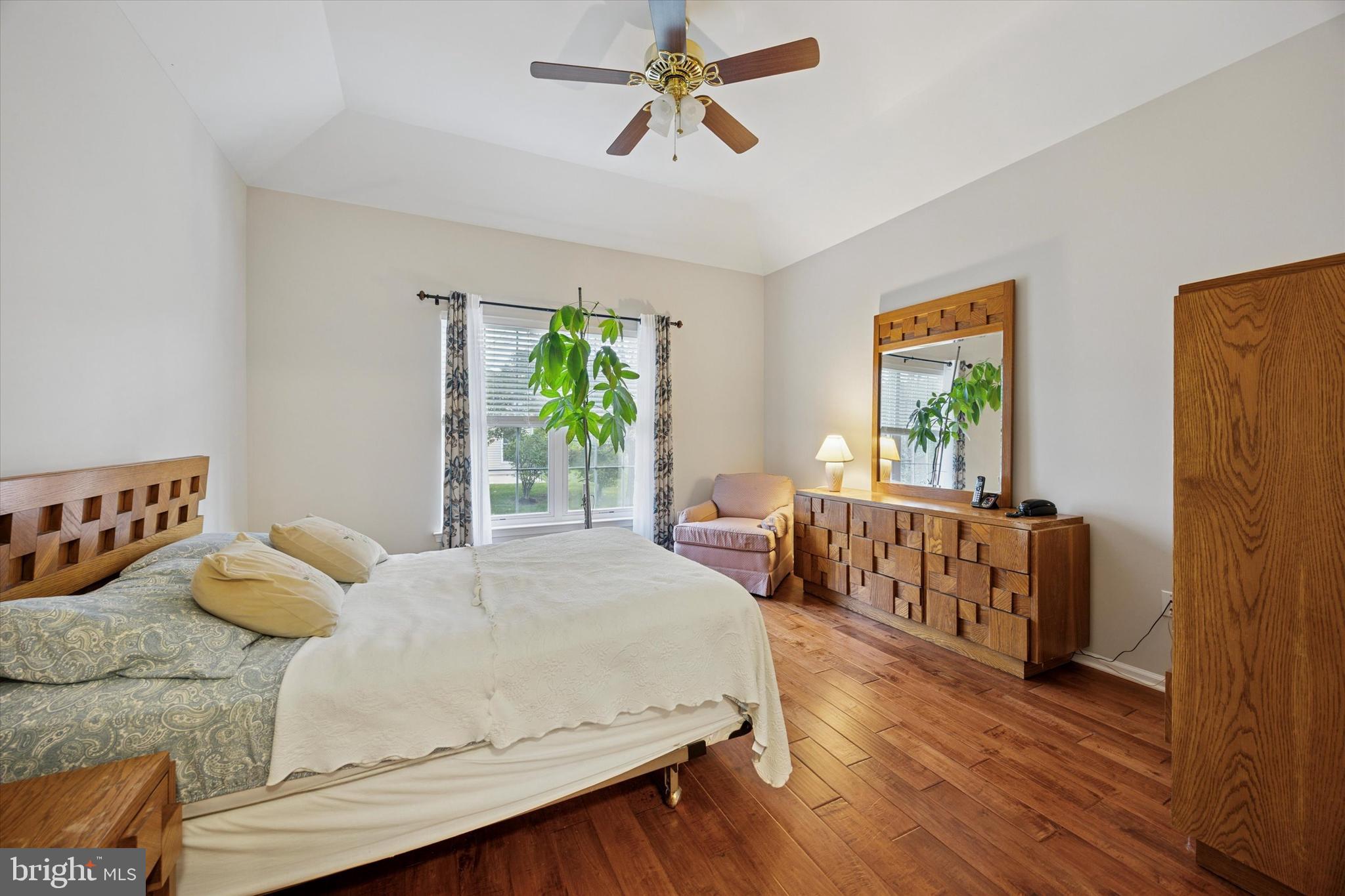 113 Summit Street Glassboro, NJ 08028 - Photo 15 of 25 a bedroom with a bed and a chandelier