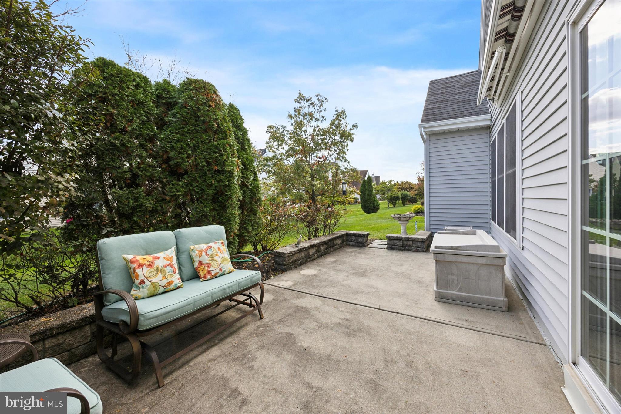 113 Summit Street Glassboro, NJ 08028 - Photo 23 of 25 a white bench sitting in front of a building
