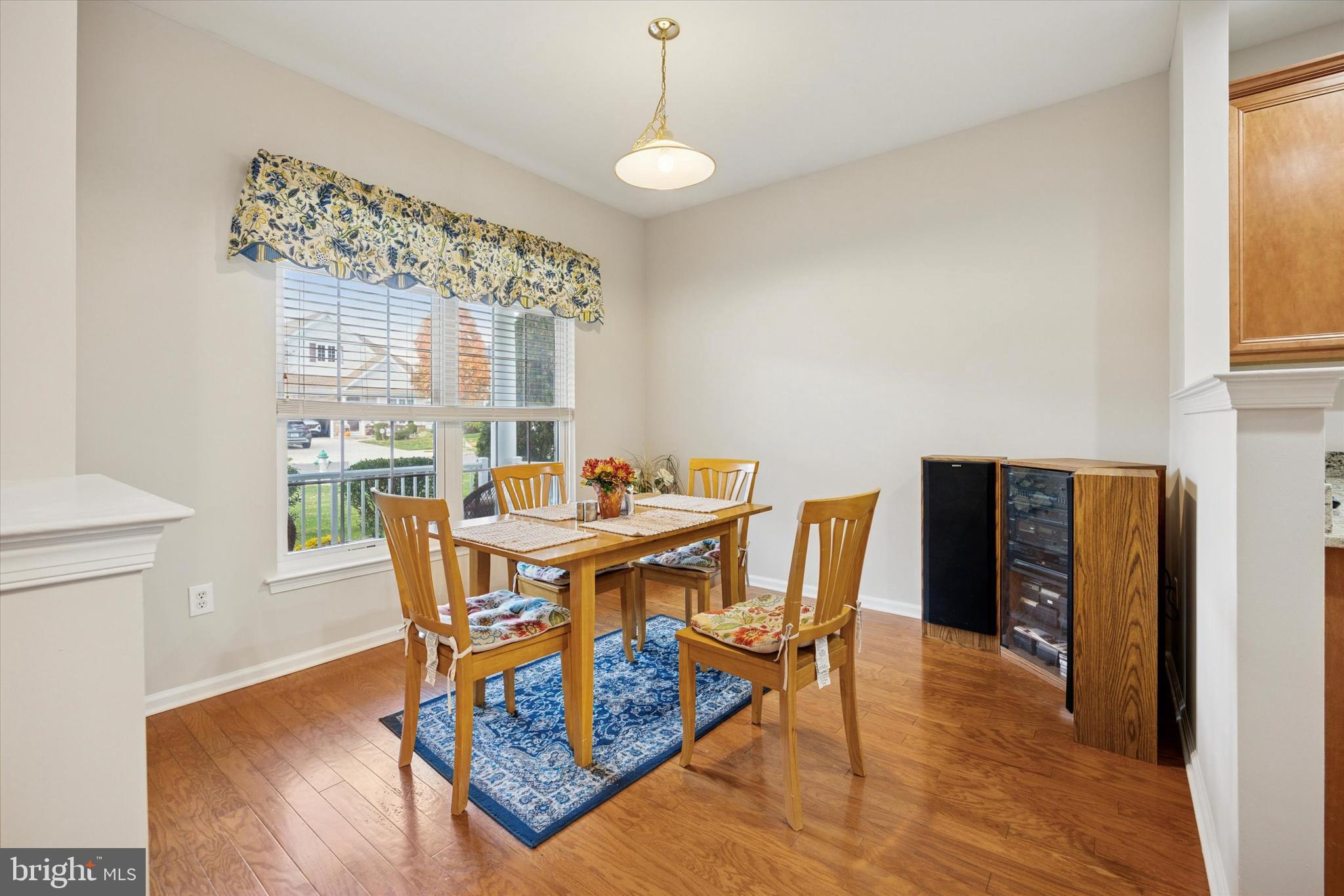113 Summit Street Glassboro, NJ 08028 - Photo 6 of 25 a view of a dining room with furniture window and wooden floor