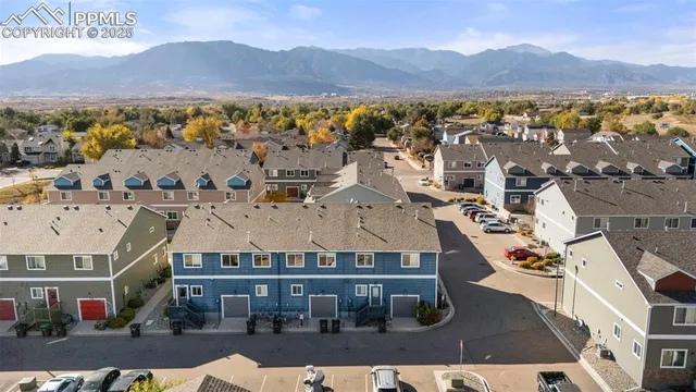 a view of a city with mountain