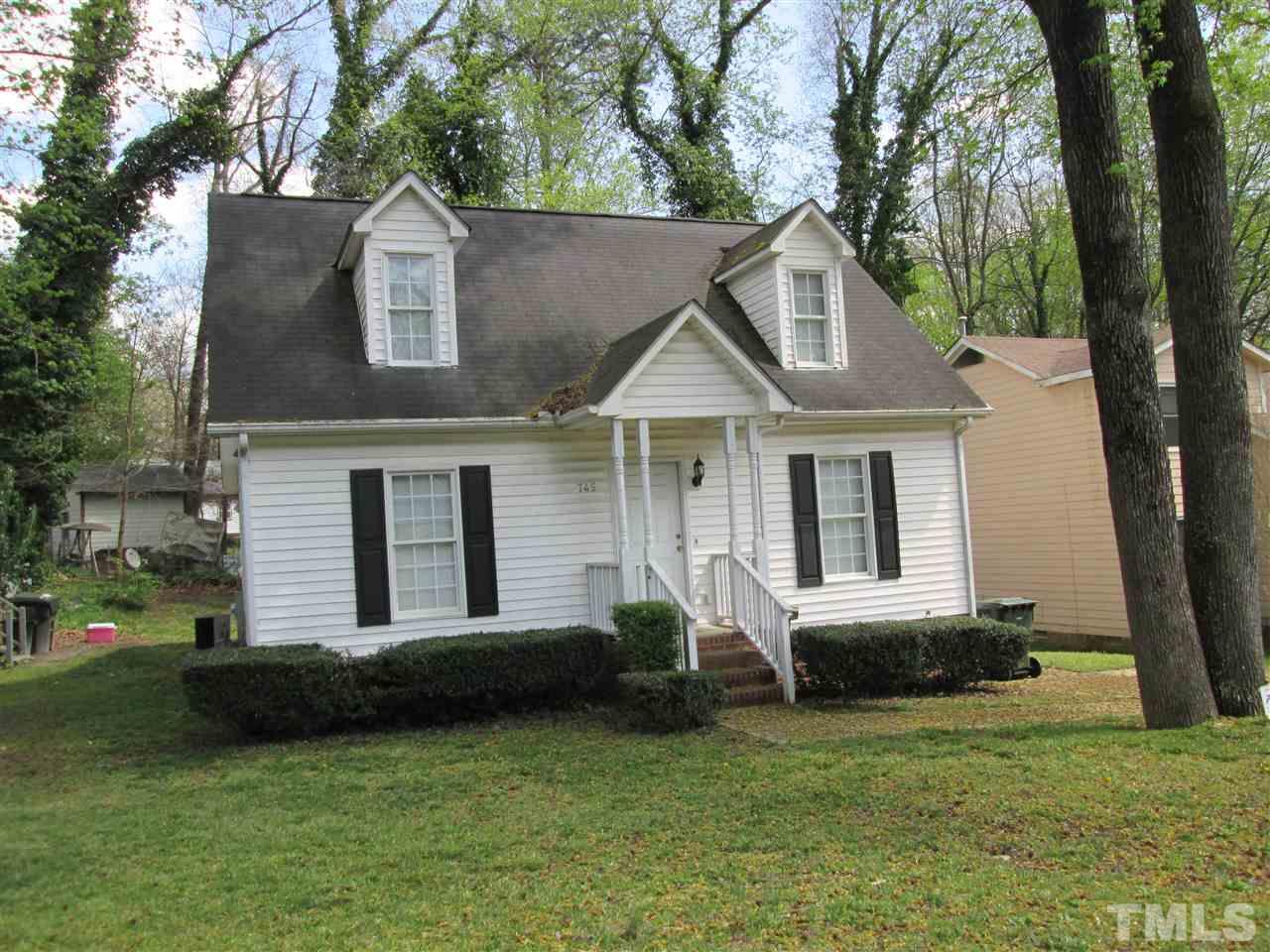 745 Rawls Drive Raleigh, NC 27610 - Photo 1 of 5 a house that has a big yard in front of it