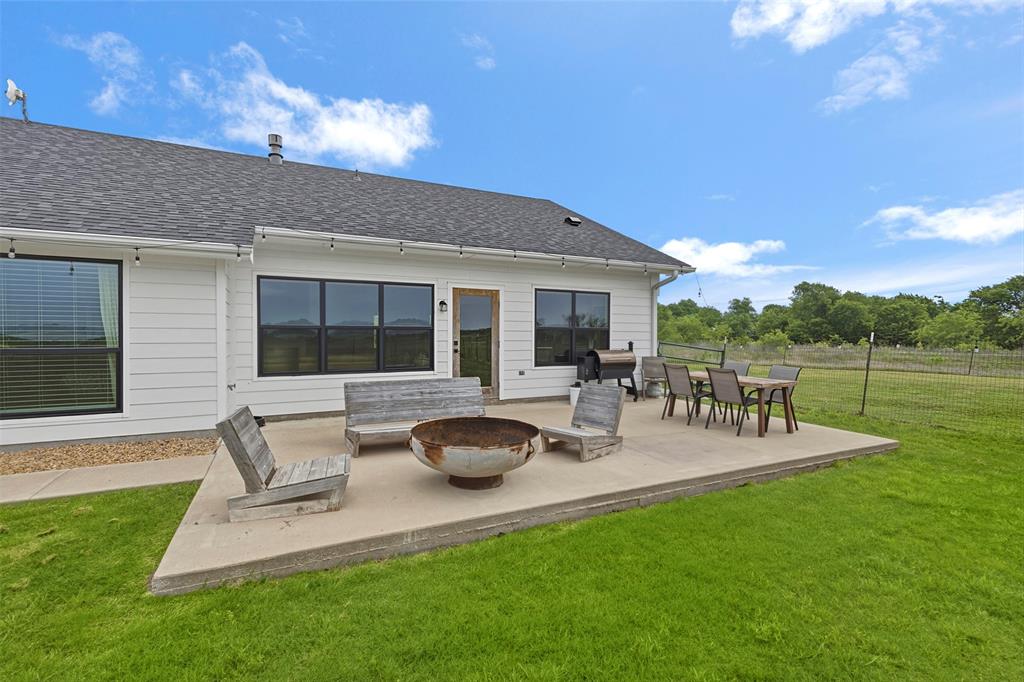 2990 Wilson Road Palmer, TX 75152 - Photo 35 of 40 a view of outdoor space yard deck patio and outdoor kitchen