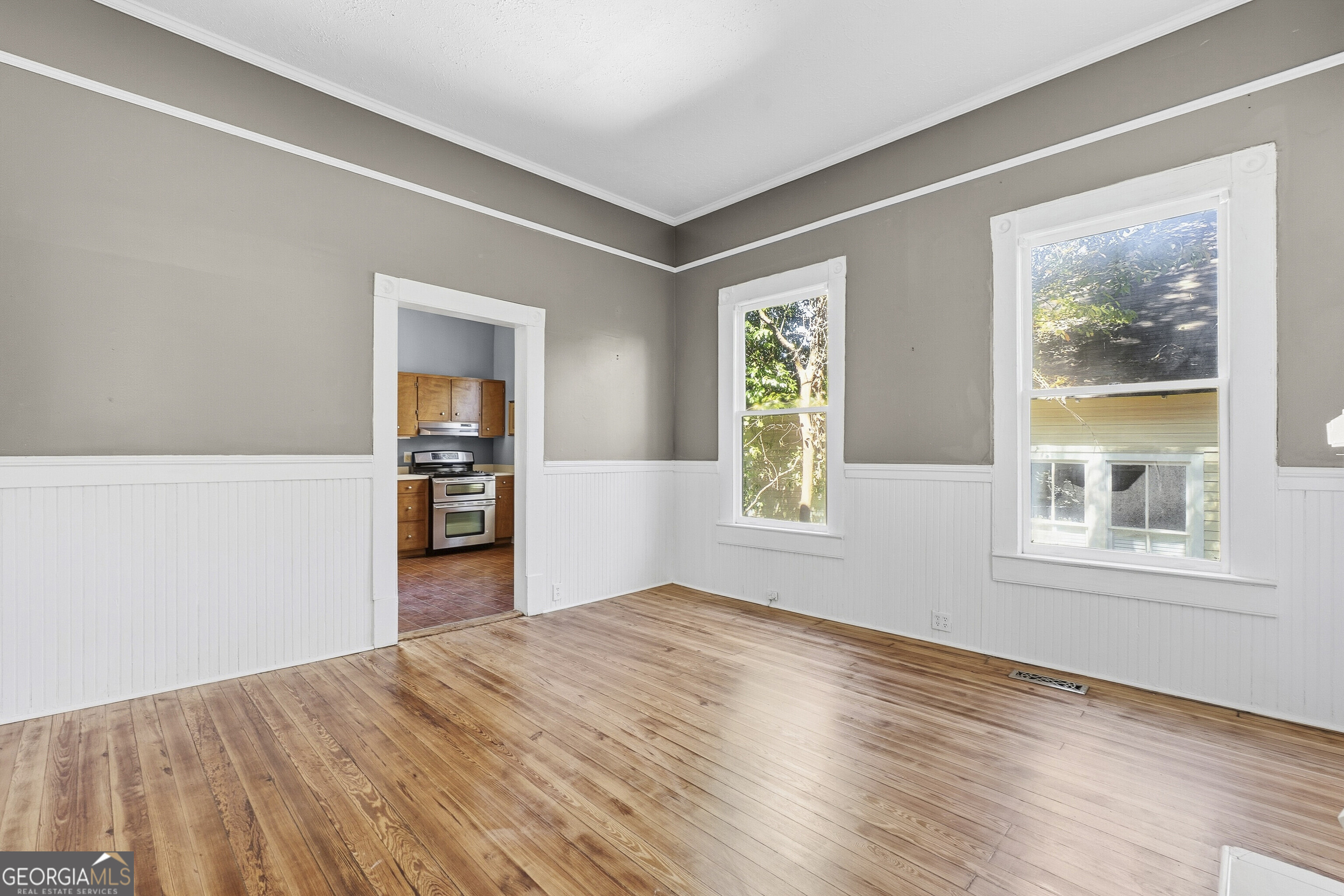 216 Hines Terrace Macon, GA 31204 - Photo 25 of 52 a view of empty room with wooden floor and fan