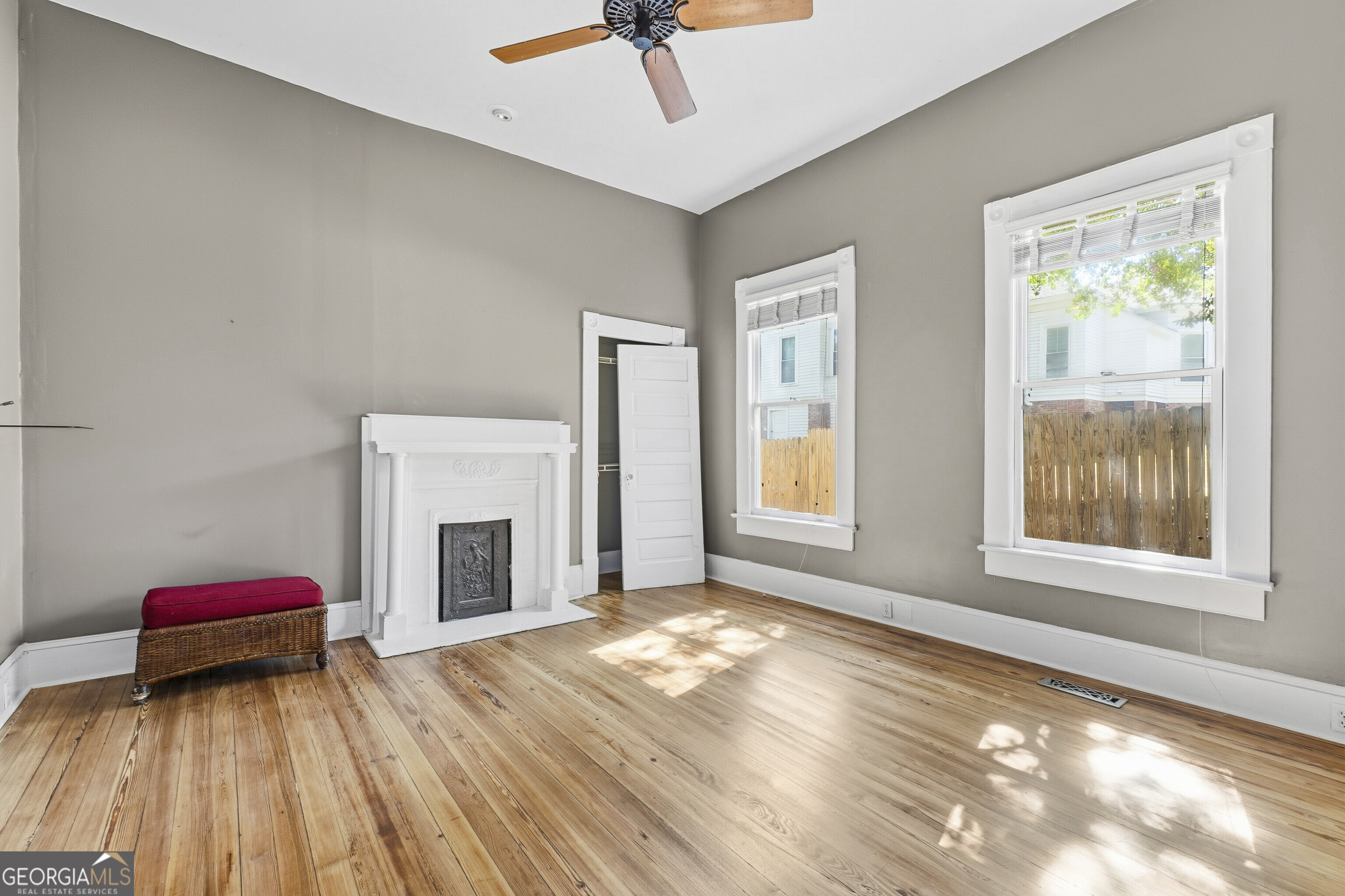 216 Hines Terrace Macon, GA 31204 - Photo 28 of 52 a view of livingroom with window fireplace and hardwood floor