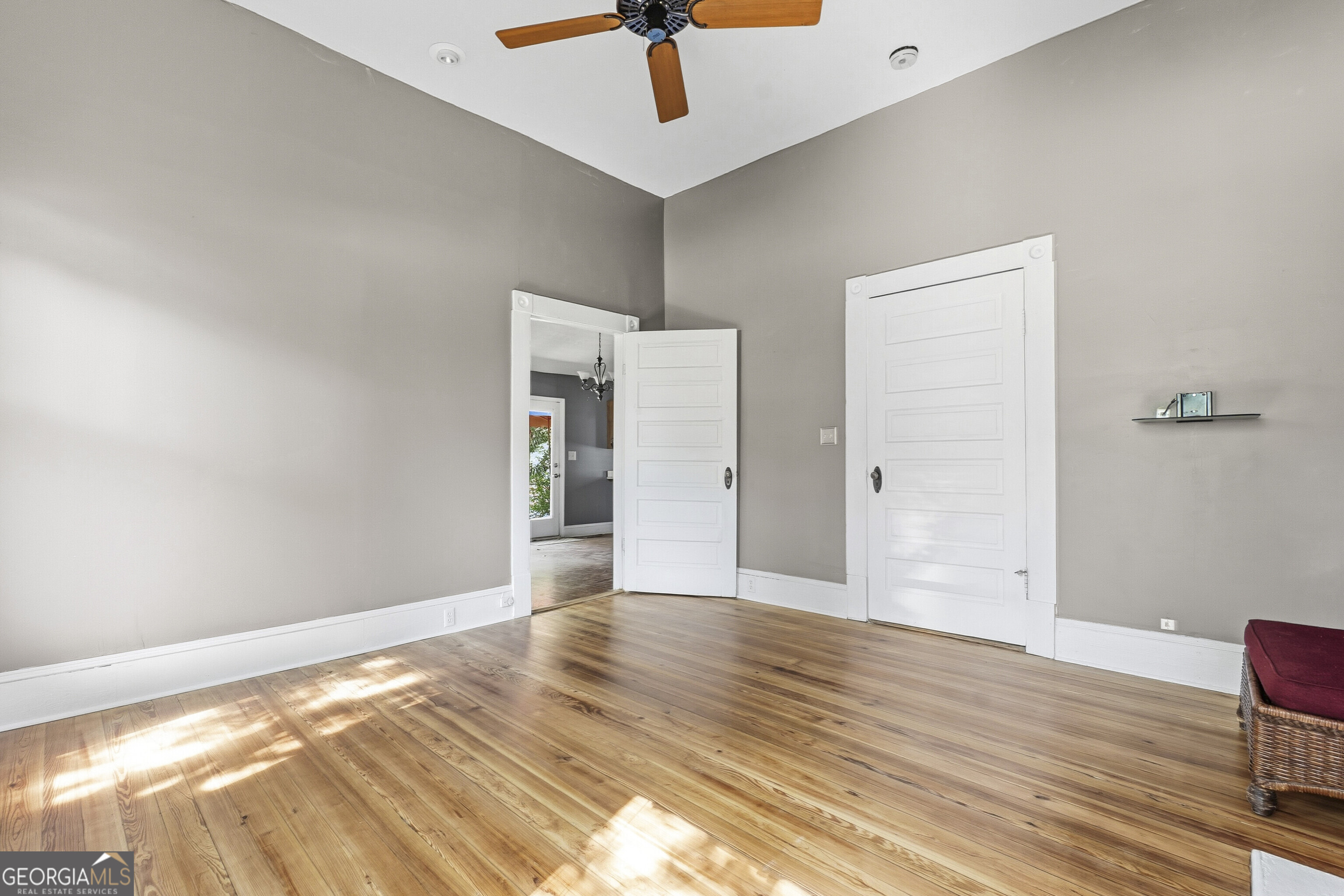 216 Hines Terrace Macon, GA 31204 - Photo 30 of 52 a view of an empty room with window and wooden floor