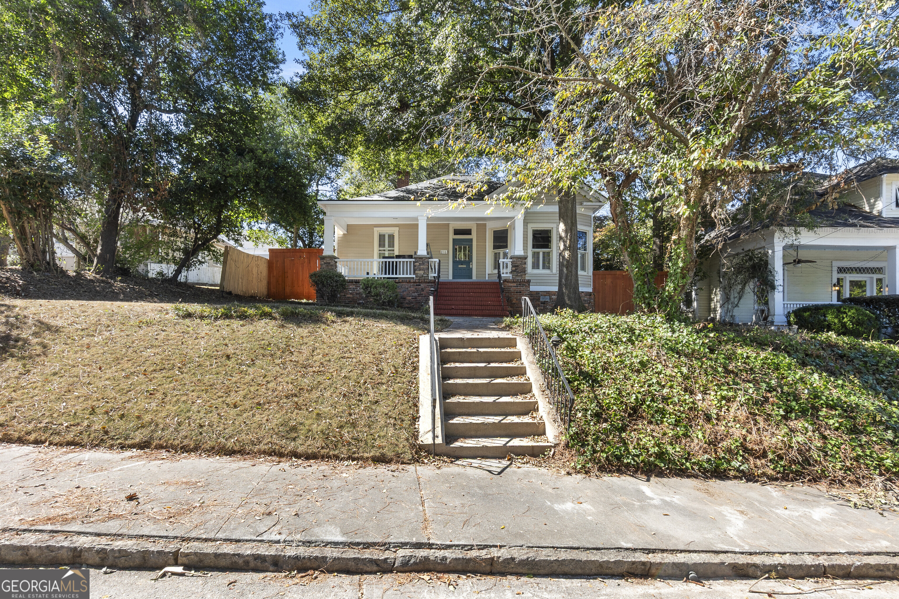216 Hines Terrace Macon, GA 31204 - Photo 3 of 52 front view of a house with a yard