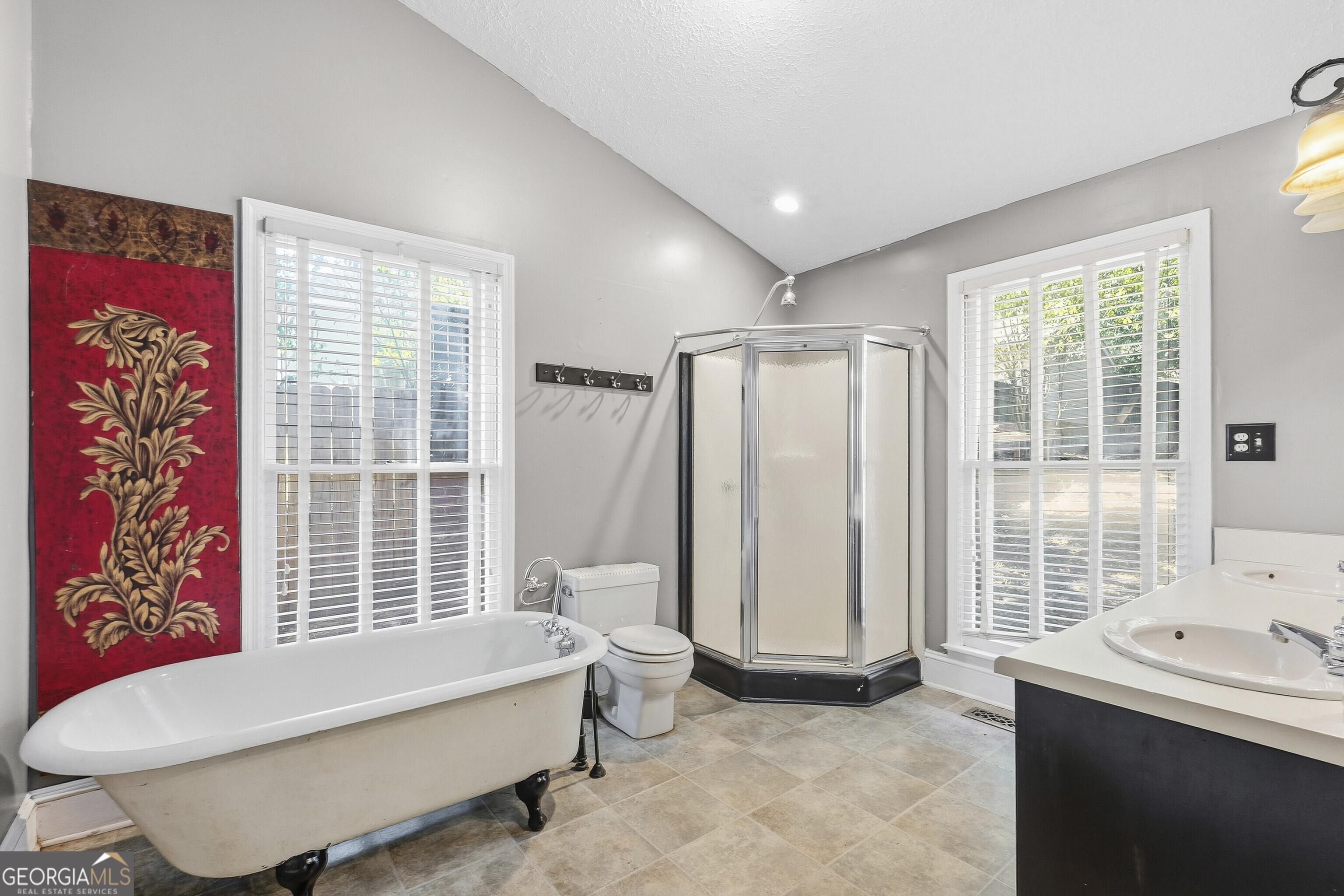216 Hines Terrace Macon, GA 31204 - Photo 39 of 52 a bathroom with a bathtub and a shower