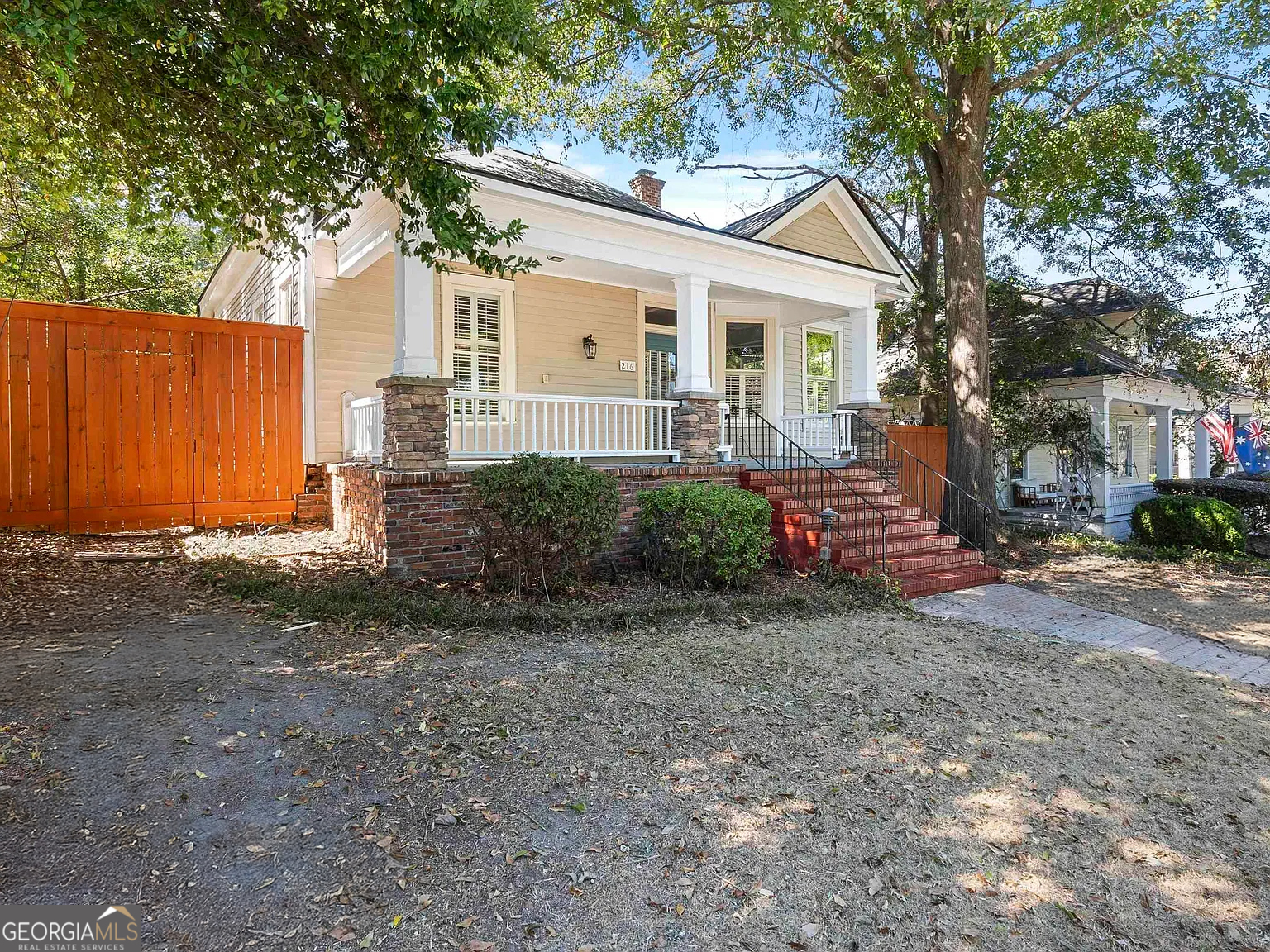 216 Hines Terrace Macon, GA 31204 - Photo 4 of 52 a view of a yard with a house and a tree