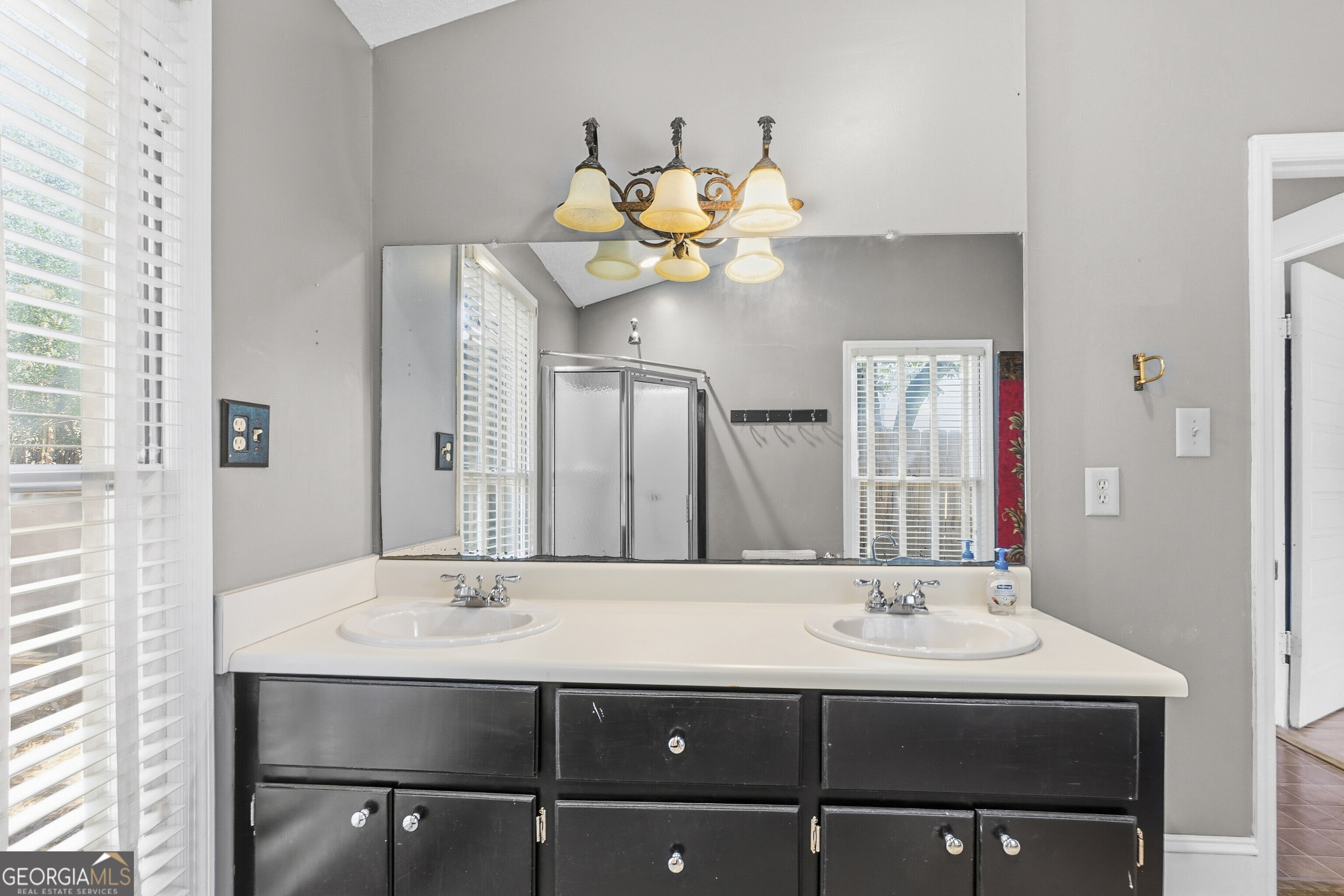 216 Hines Terrace Macon, GA 31204 - Photo 42 of 52 a bathroom with a sink and a mirror