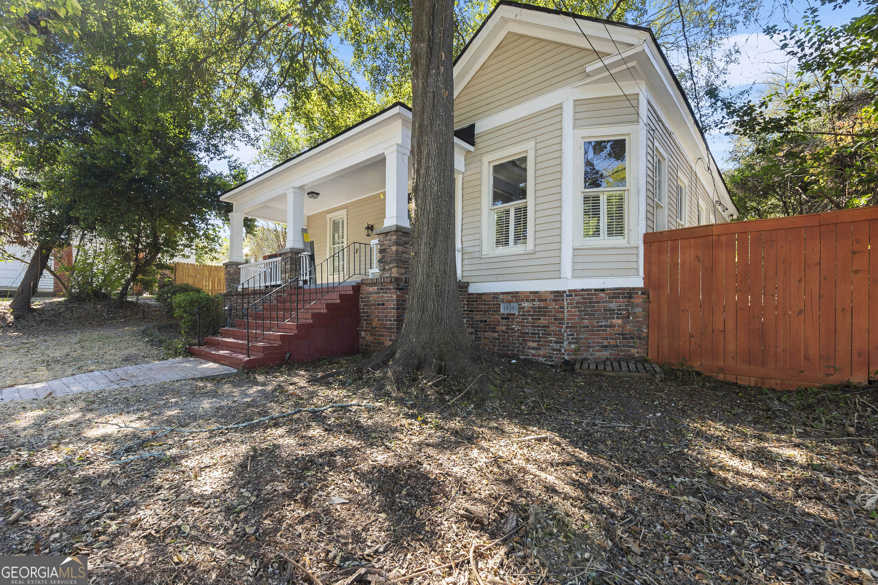 216 Hines Terrace Macon, GA 31204 - Photo 5 of 52 a view of a house with a yard and large tree