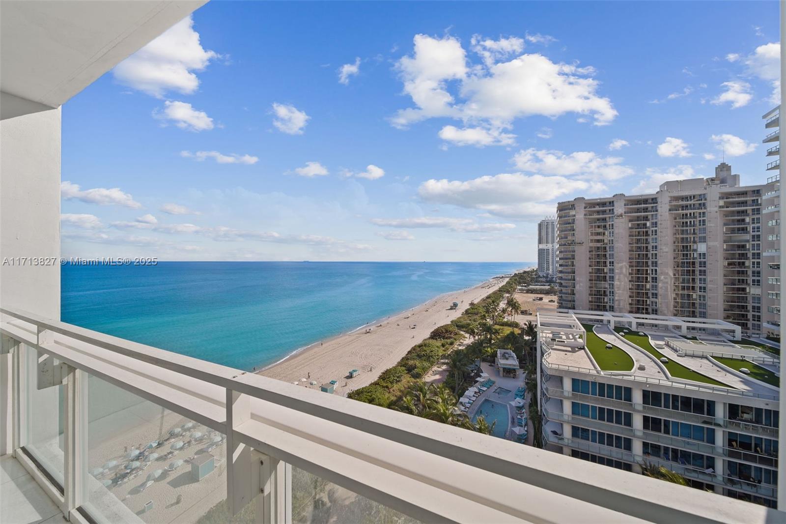 6801 Collins Avenue, Unit 1214 Miami Beach, FL 33141 - Photo 20 of 59 a view of a balcony with an ocean