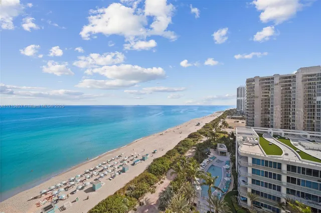 a view of a city with tall buildings