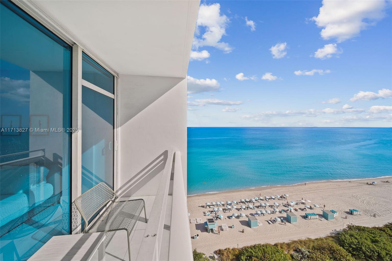 6801 Collins Avenue, Unit 1214 Miami Beach, FL 33141 - Photo 23 of 59 a view of an ocean beach