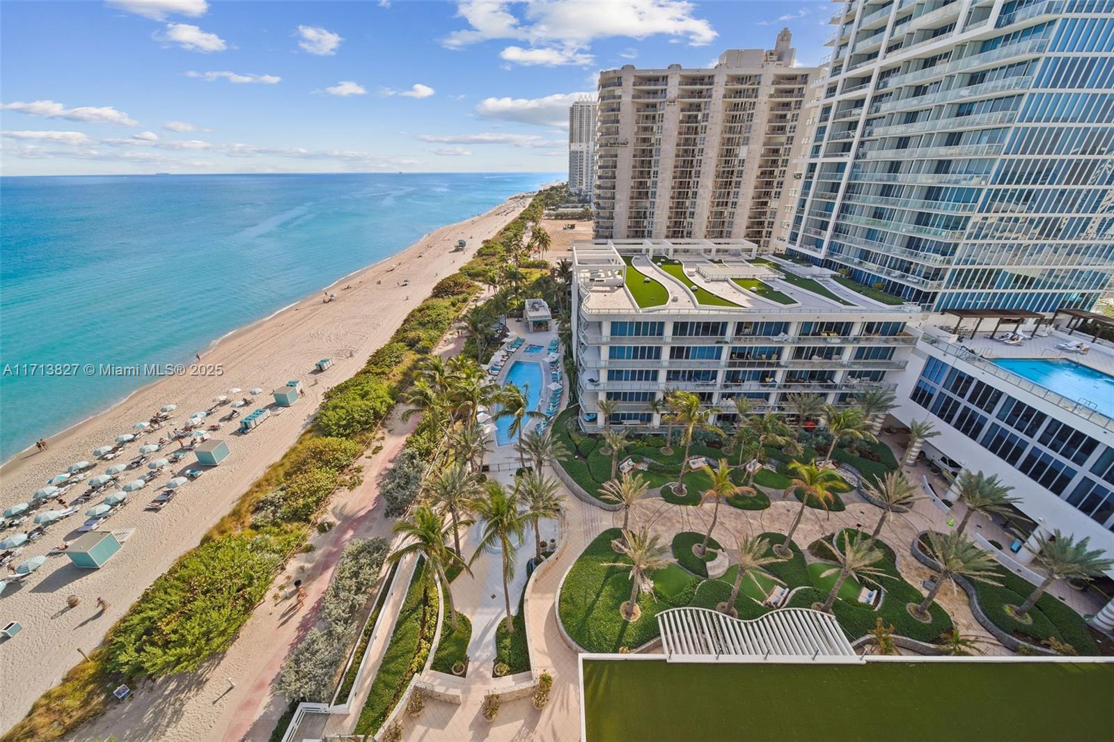 6801 Collins Avenue, Unit 1214 Miami Beach, FL 33141 - Photo 24 of 59 a view of building with outdoor space