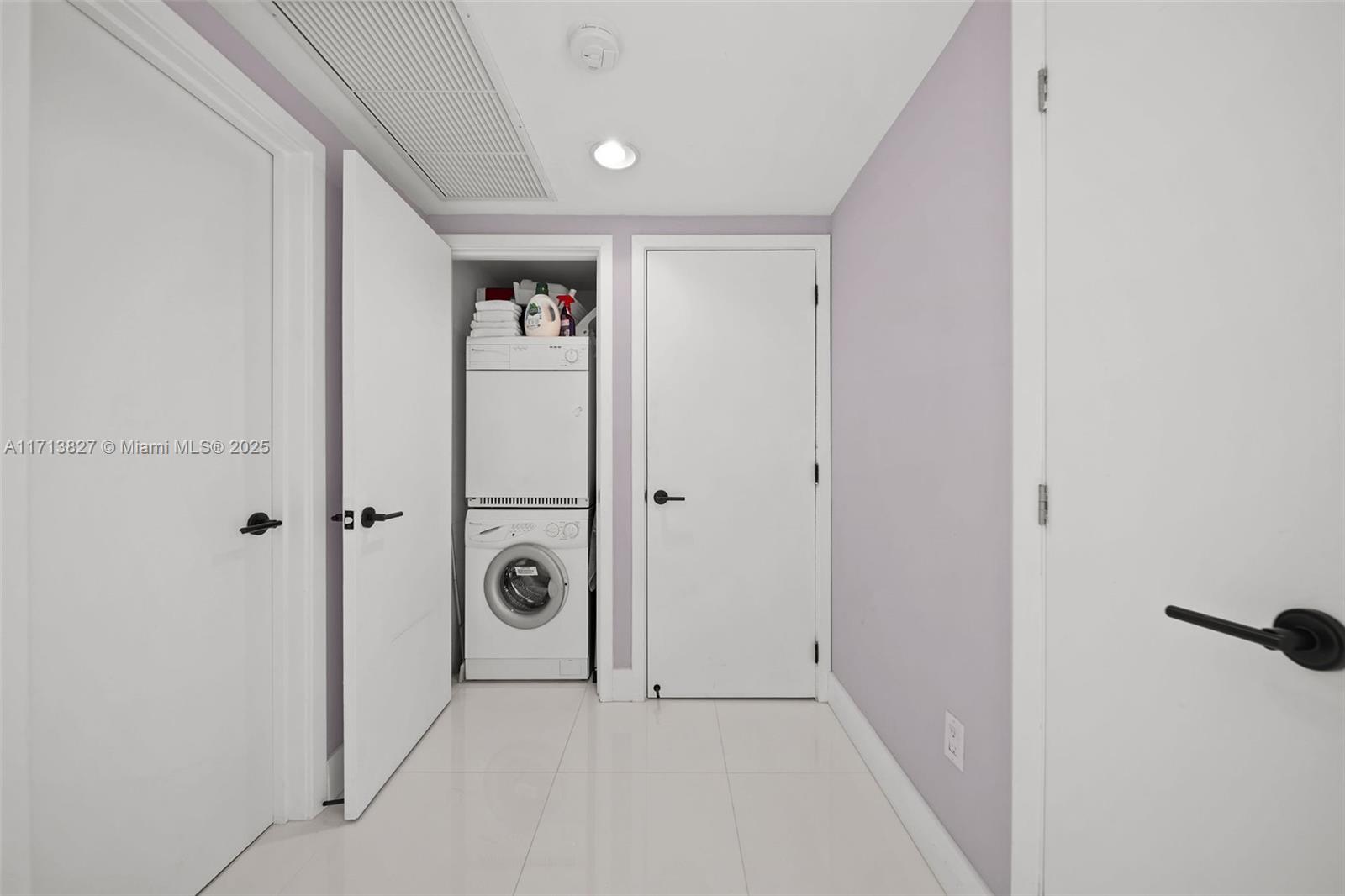 6801 Collins Avenue, Unit 1214 Miami Beach, FL 33141 - Photo 26 of 59 a view of a livingroom with wooden floor