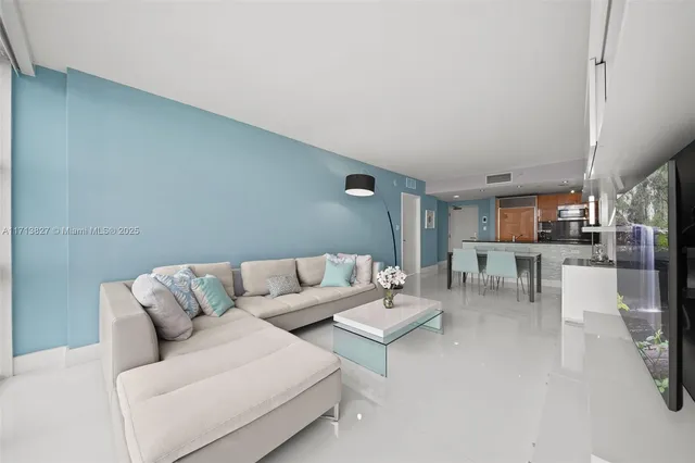 a living room with furniture and a couch