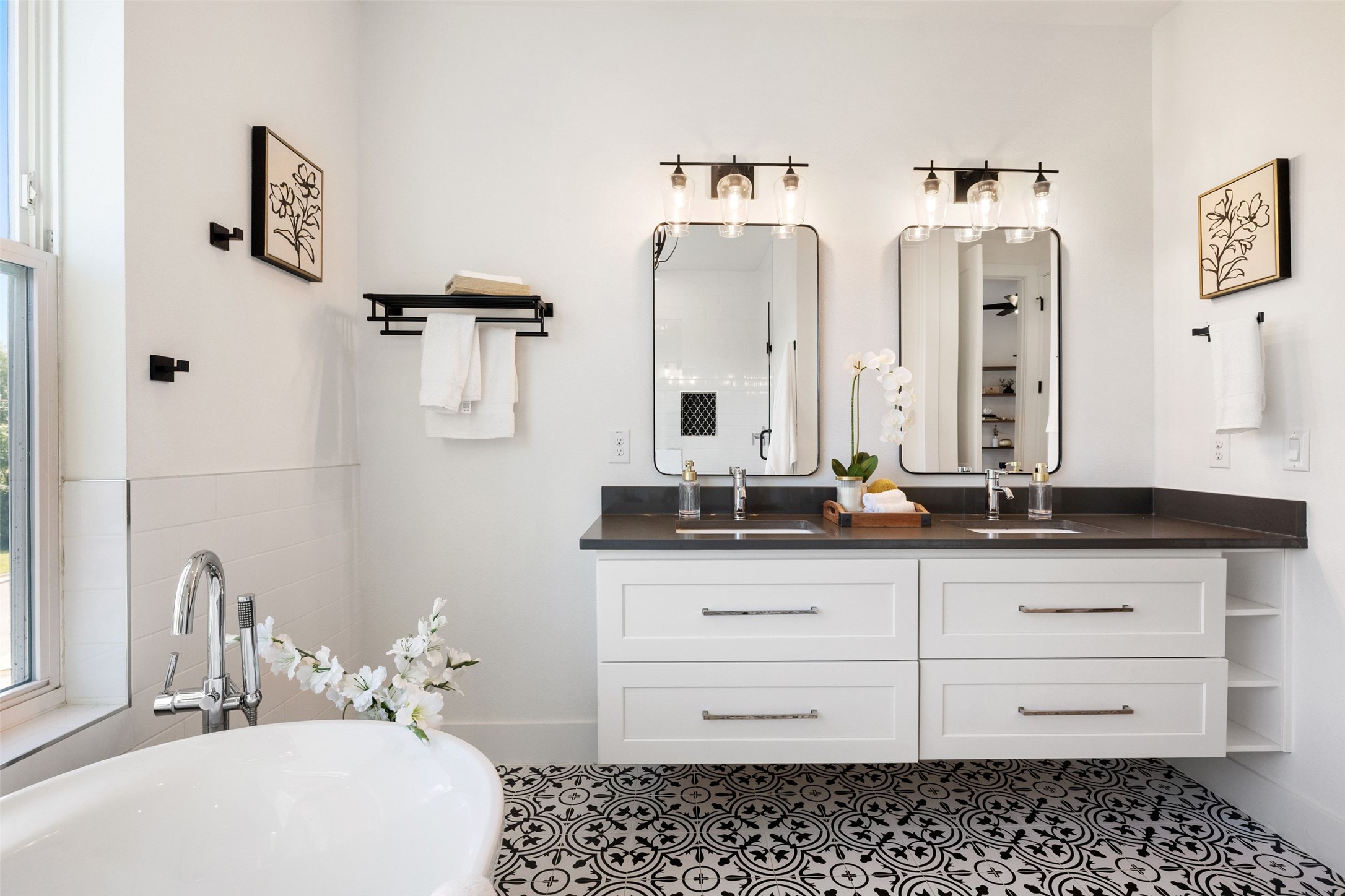 5601 Jackie Robinson Street, Unit 1 Austin, TX 78721 - Photo 21 of 40 Spa-inspired primary suite serves as a true retreat, featuring a luxurious bath and oversized walk-in closet.