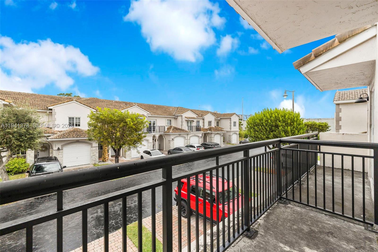 8331 Southwest 124th Avenue, Unit 10414 Miami, FL 33183 - Photo 20 of 24 a view of city from a balcony
