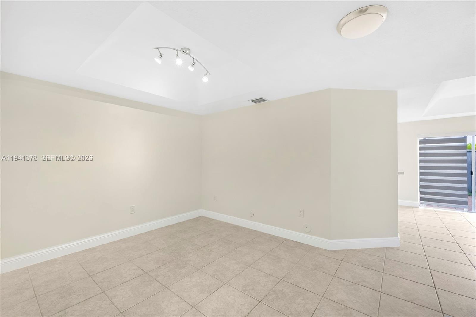 8331 Southwest 124th Avenue, Unit 10414 Miami, FL 33183 - Photo 3 of 24 a view of an empty room