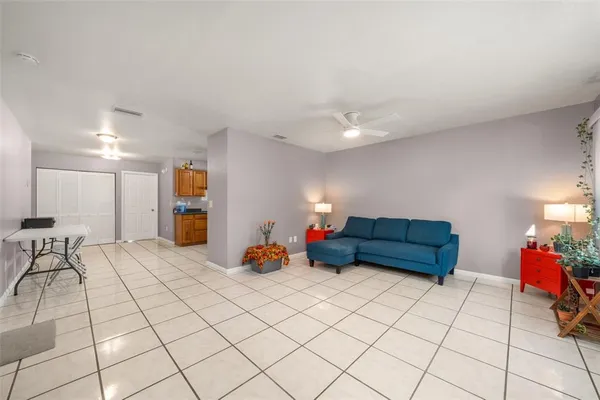 a living room with furniture and a table