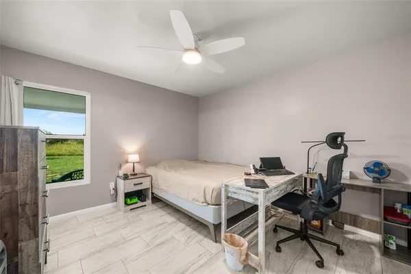 a bed room with a bed and a table