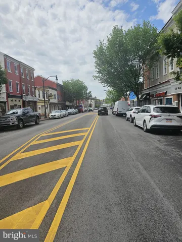 a view of a street with cars