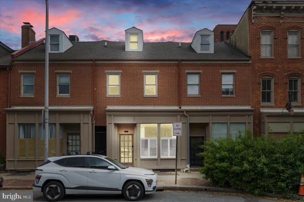 a car parked in front of a building