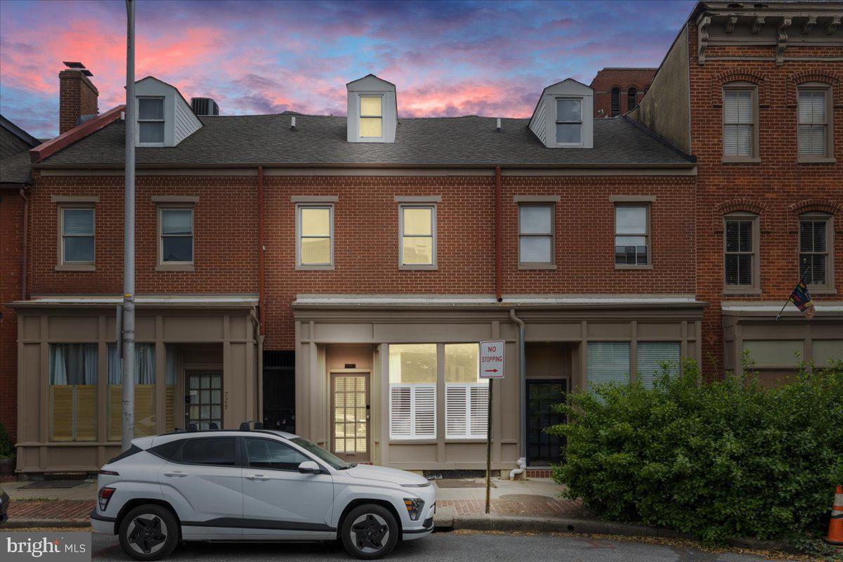 731 South Hanover Street, Unit R2 Baltimore, MD 21230 - Photo 1 of 17 a car parked in front of a building