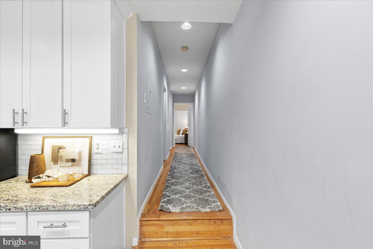 731 South Hanover Street, Unit R2 Baltimore, MD 21230 - Photo 7 of 17 a view of a kitchen with granite countertop cabinets