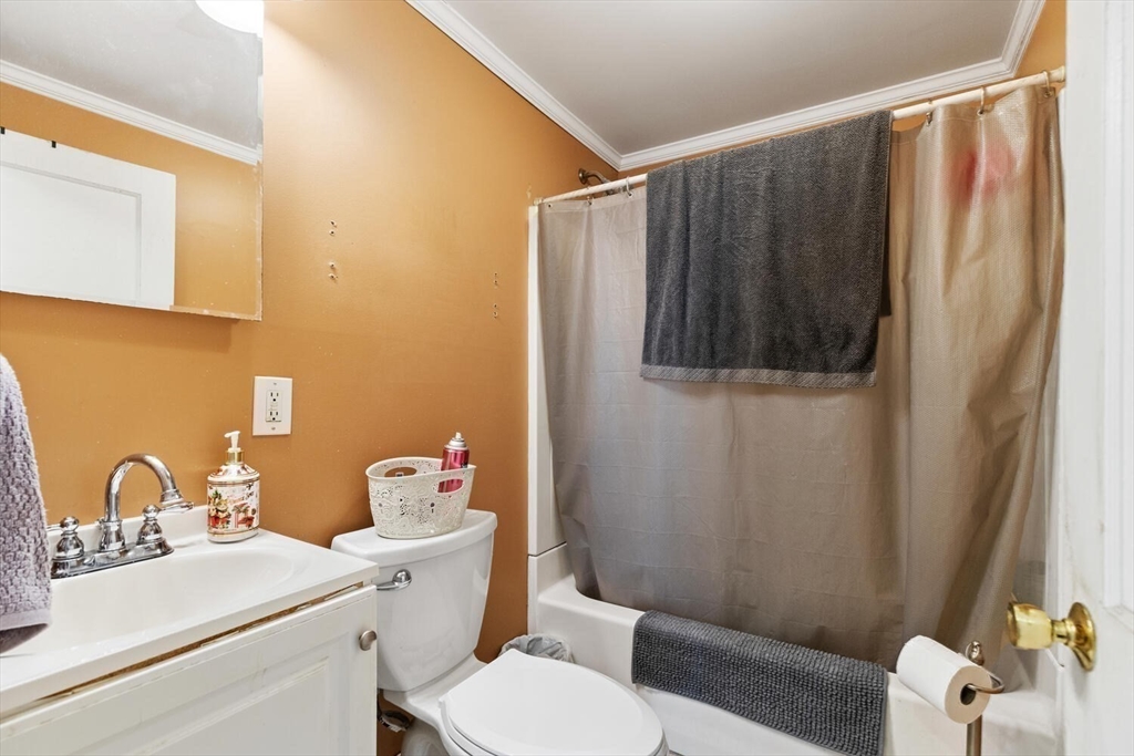 152 Springvale Avenue Everett, MA 02149 - Photo 20 of 30 a bathroom with a sink toilet and shower