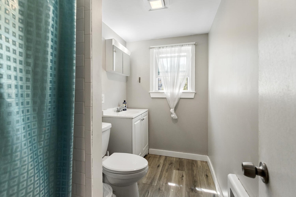 152 Springvale Avenue Everett, MA 02149 - Photo 24 of 30 a bathroom with a sink and toilet