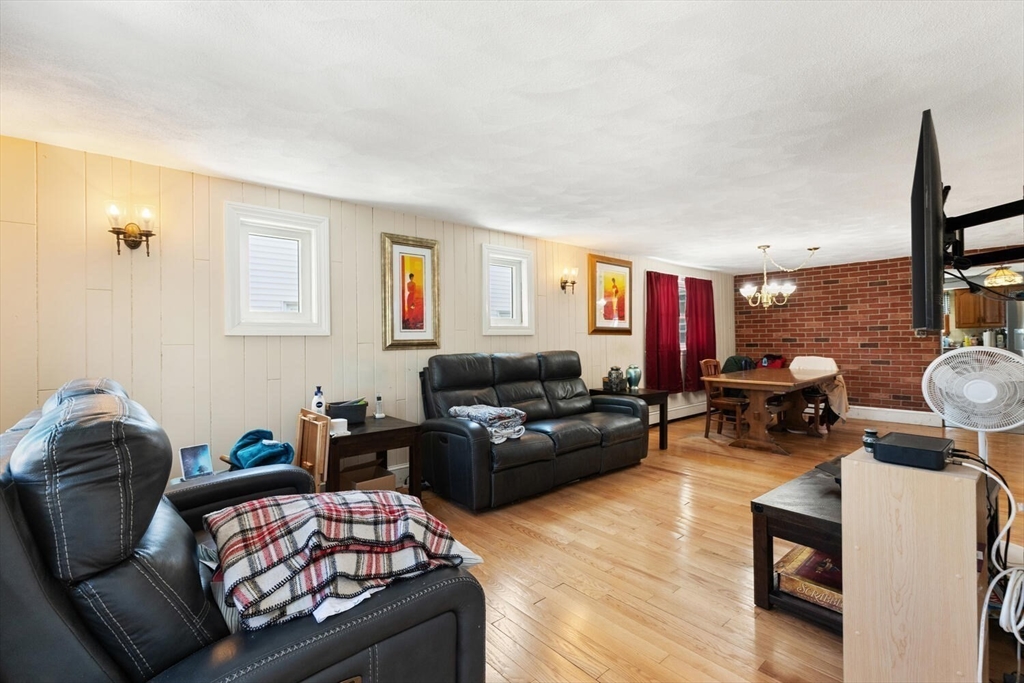 152 Springvale Avenue Everett, MA 02149 - Photo 6 of 30 a living room with furniture and a window