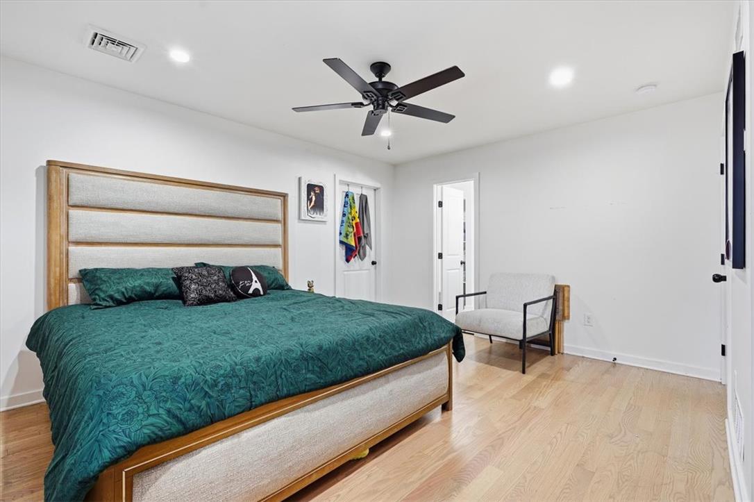 2930 Oakland Road Bethlehem, PA 18017 - Photo 21 of 55 Gleaming hardwood floors and recessed lighting enhance this modern bedroom space.