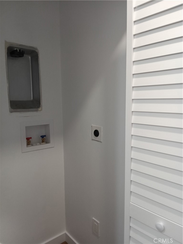 66954 Appian Way Joshua Tree, CA 92252 - Photo 24 of 26 a view of a room with washer and dryer